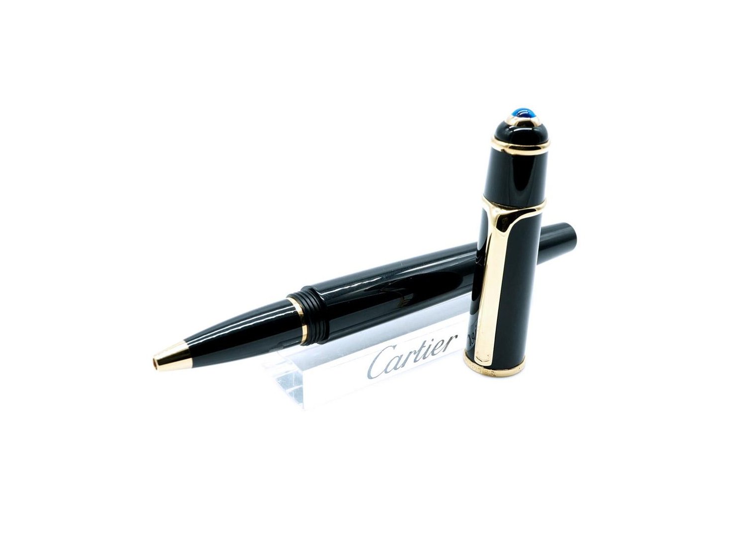 CARTIER Diabolo roller pen in yellow gold plated steel and black composite Ref. ST180001. NEW