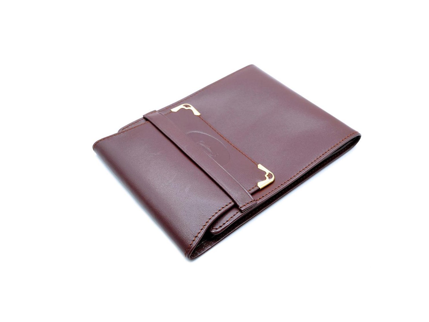 CARTIER portamonete quadrato Le Must de Cartier in pelle bordeaux e metallo placcato oro giallo Ref. L3000464. NUOVO