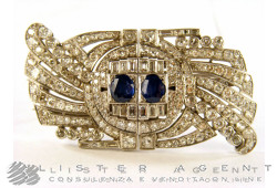 Brosche in 18 Karat Weißgold mit Diamanten und Saphiren.