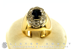 ANELLO in oro giallo 18Kt con diamanti e zaffiro.